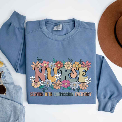 Serving With Compassion Everyday Nurse Sweatshirt