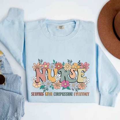 Serving With Compassion Everyday Nurse Sweatshirt